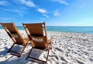 On the beach, sun-loungers, beach towels