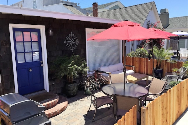 Shared front patio. The Dock is the back unit of this classic duplex.