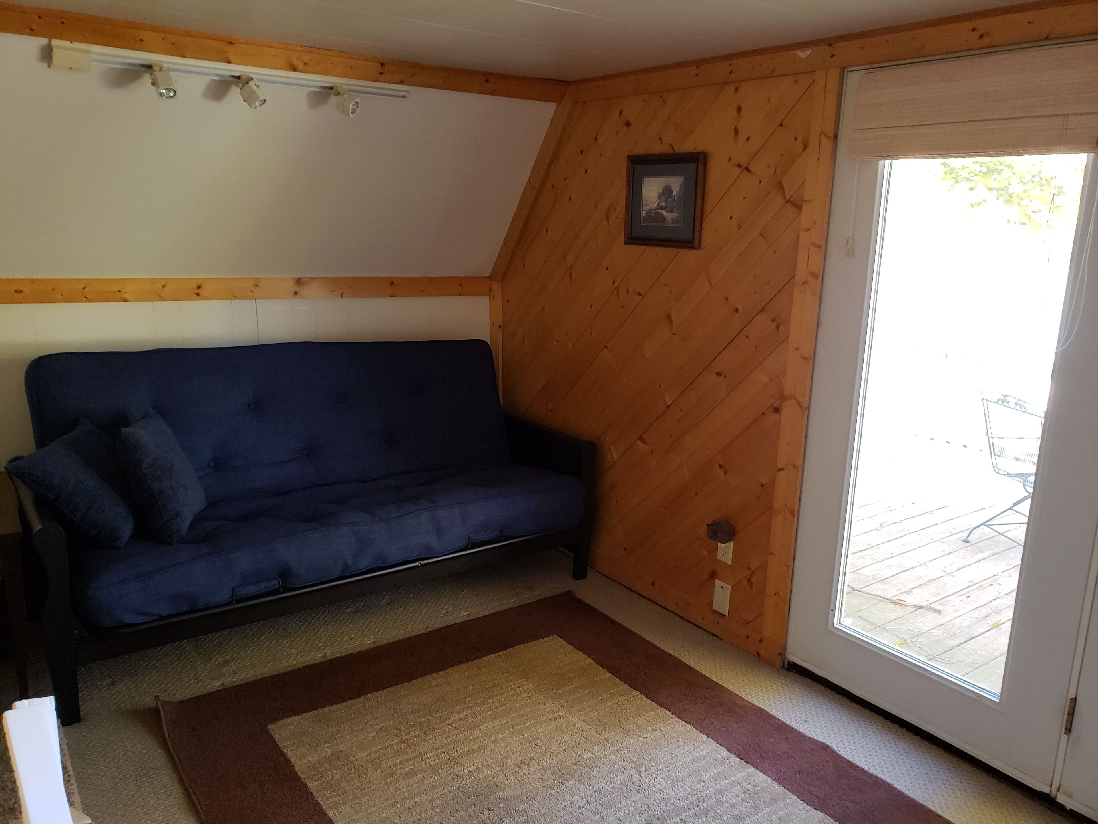 The Point is a waterfront rental with covered boat dock at Rocky Point Indiana