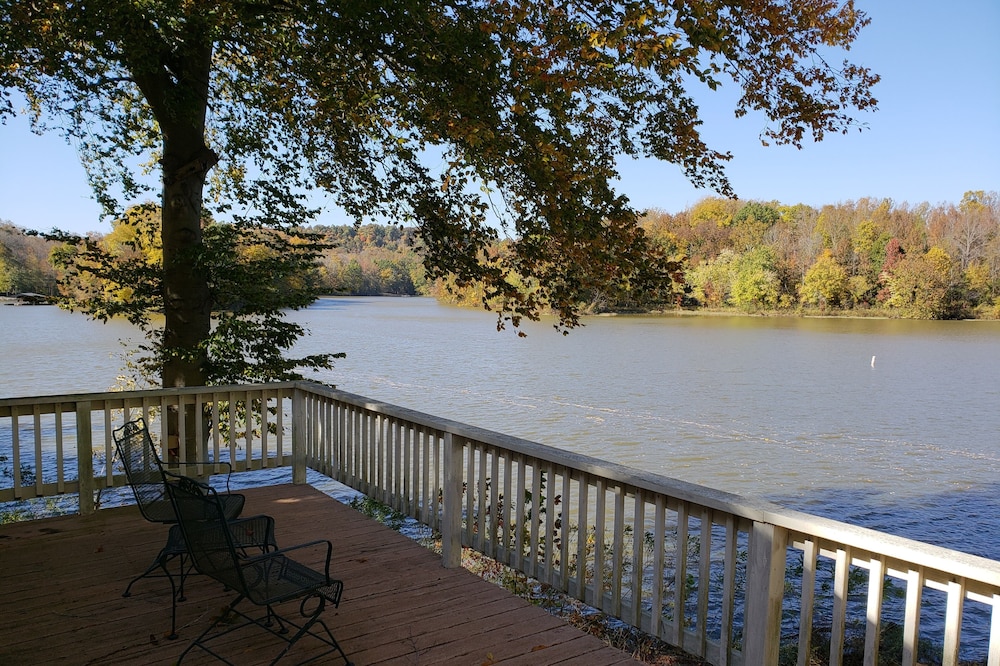 The Point is a waterfront rental with covered boat dock at Rocky Point Indiana