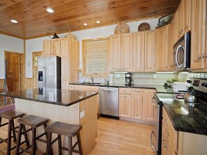 Dishwasher, coffee/tea maker, cookware/dishes/utensils, dining tables - Above It All- Cabin, Hot Tub, Pet Friendly, Pool Table, Mtn View, Gas Fireplace (Seven Devil's)