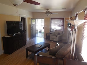 Smart TV, fireplace, DVD player, books