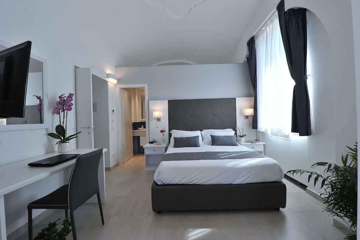 Family Quadruple Room, 1 Queen Bed with Sofa bed, Garden View | Premium bedding, down comforters, minibar, in-room safe