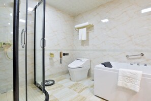 Deep-soaking bathtub, rainfall showerhead, free toiletries, hair dryer