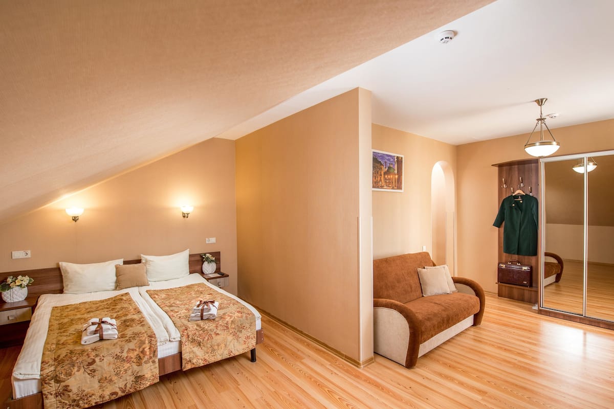 Junior Suite | Desk, laptop workspace, blackout drapes, iron/ironing board (on request)