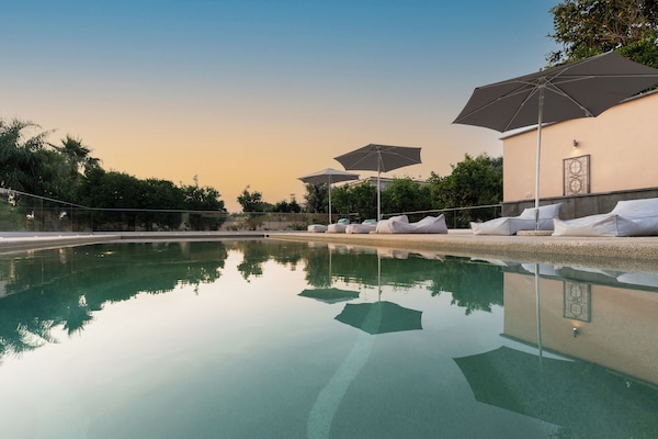 Indoor pool, seasonal outdoor pool, pool umbrellas, sun loungers