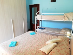 Standard Quadruple Room, 1 Bedroom, Balcony, Garden View | 1 bedroom, free WiFi, bed sheets