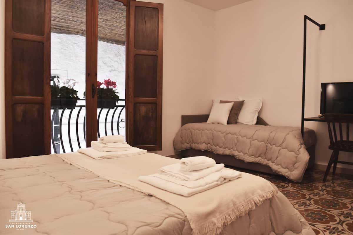 Comfort Quadruple Room | Premium bedding, desk, blackout drapes, soundproofing