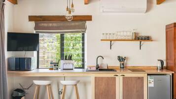 Mini-fridge, microwave, stovetop, electric kettle