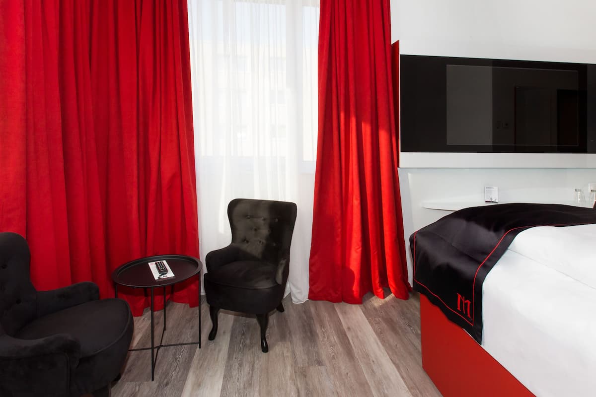 comfort room (dormero) | free minibar items, in-room safe, blackout curtains, soundproofing