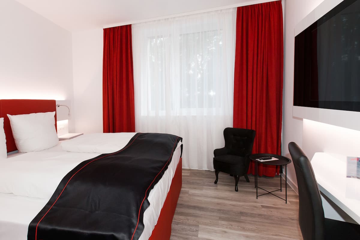 standard room (dormero) | free minibar items, in-room safe, blackout curtains, soundproofing