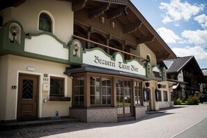 A traditional building with a sign reading "Brauerei Tuxer Hof". - Tuxie Haus (Tux)