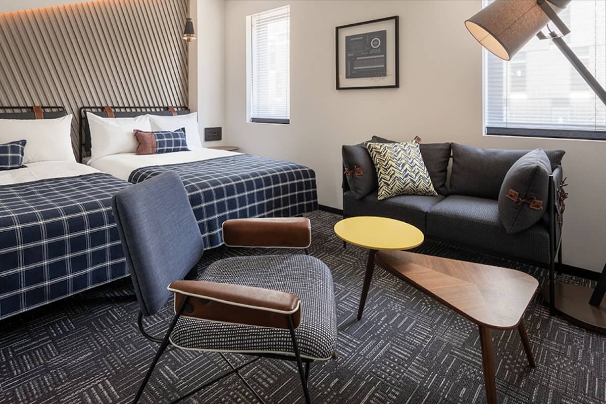 Deluxe-Zweibettzimmer, Nichtraucher | Daunenbettdecken, Zimmersafe, individuell dekoriert, kostenloses WLAN
