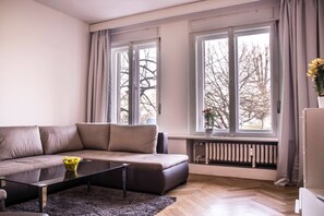 Departamento exclusivo | Área de sala de estar | Televisión de pantalla plana 