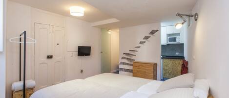 Estudio, 2 camas individuales | Cunas gratuitas, camas supletorias, wifi gratis y ropa de cama