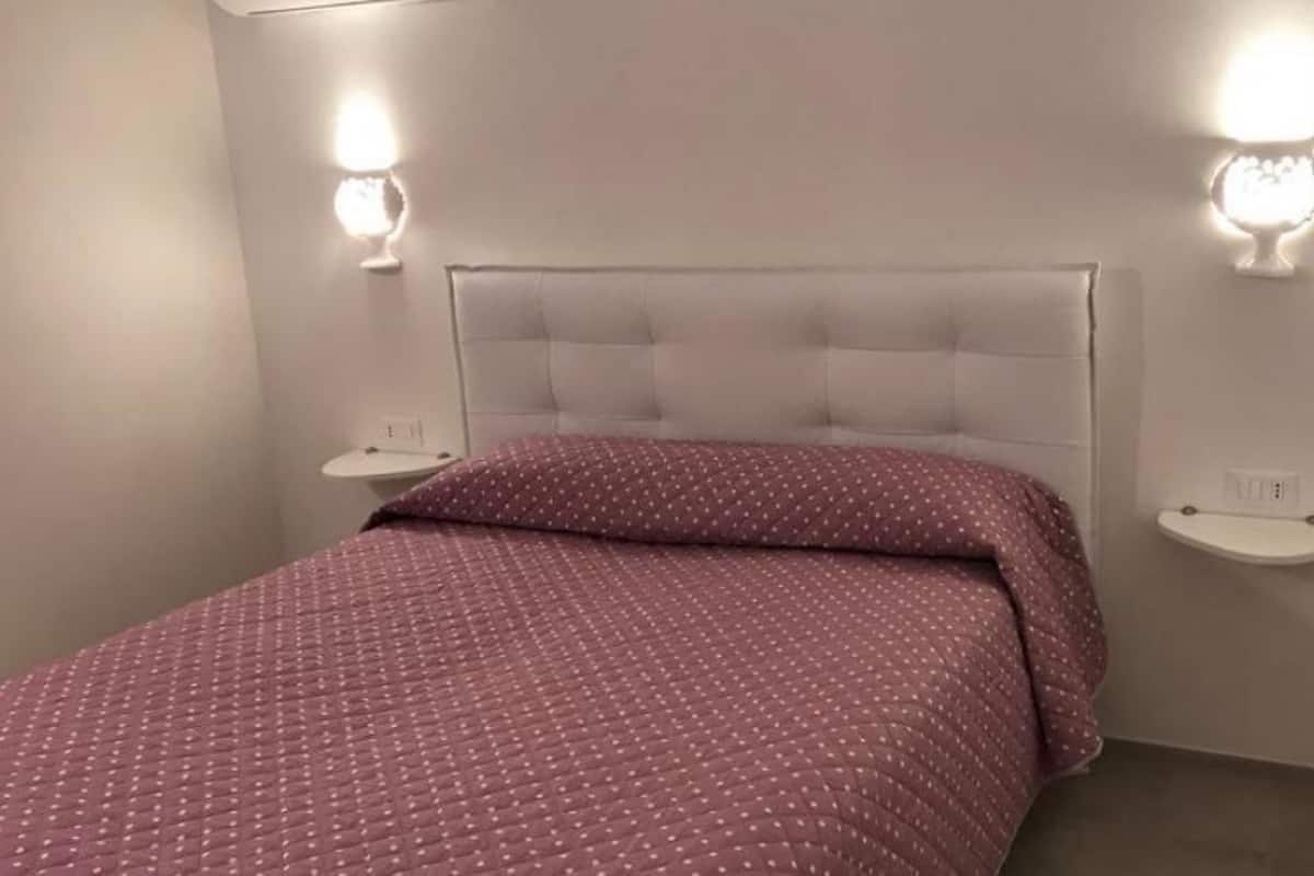Deluxe Apartment, 1 Bedroom | 1 bedroom, minibar, soundproofing, iron/ironing board