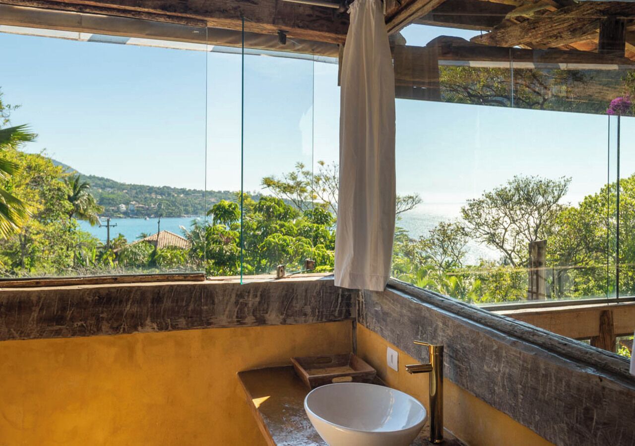 Suite VIP | Banheiro | Chuveiro, secador de cabelo, toalhas de banho 