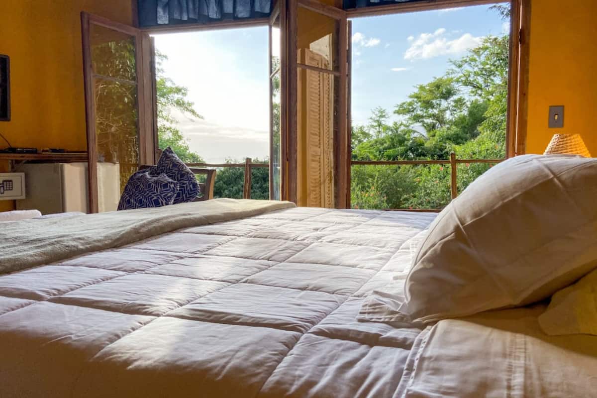 Suite Deluxe | Minibar, brankas, Wi-Fi gratis, dan seprai linen