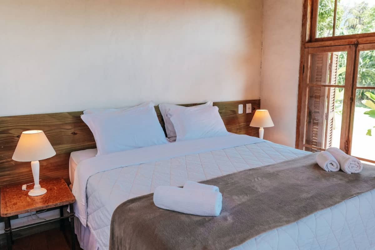Suite Deluxe | Minibar, brankas, Wi-Fi gratis, dan seprai linen