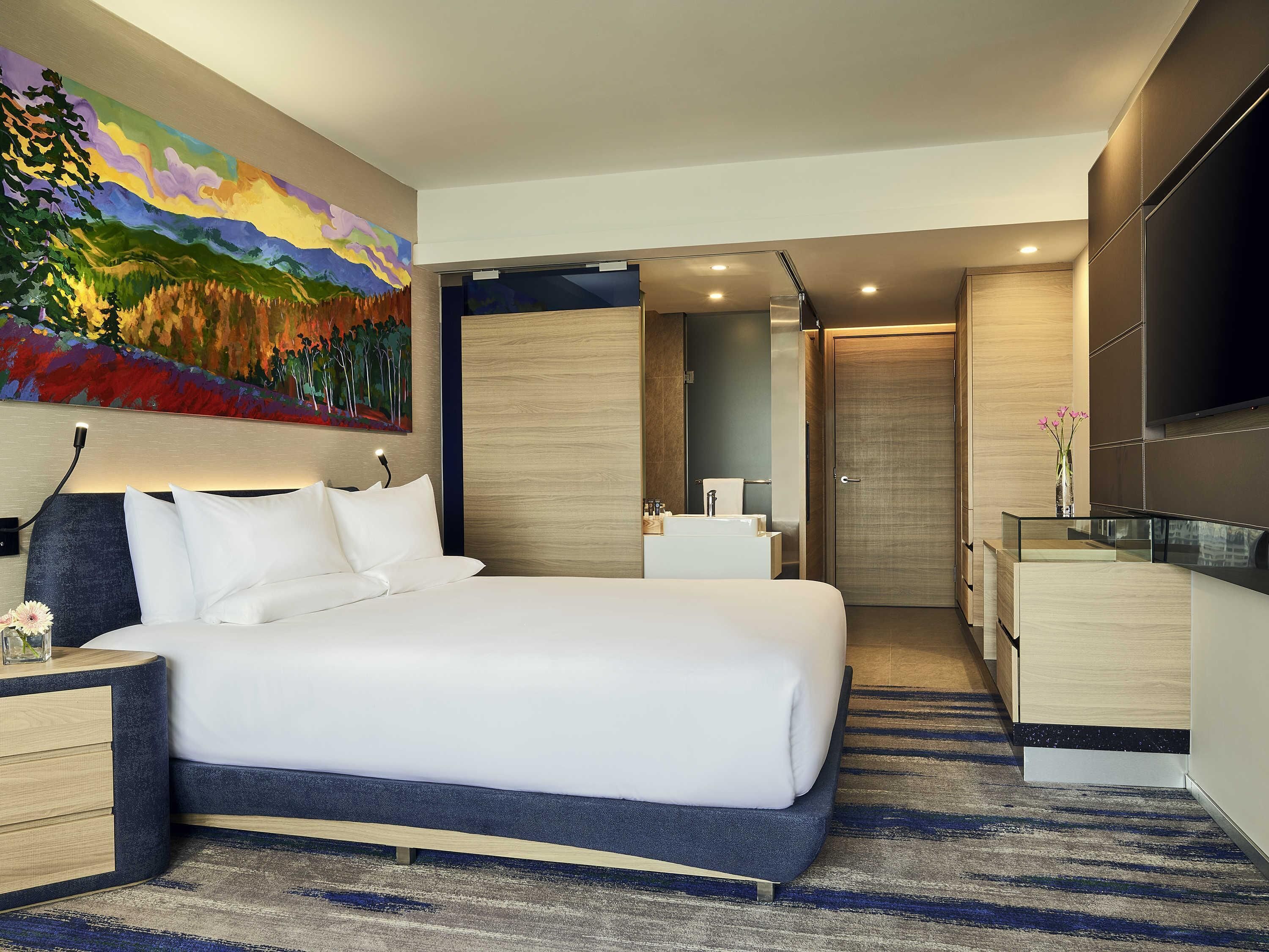 Executive appartement, 2 slaapkamers | Luxe beddengoed, een minibar, een kluis op de kamer, een bureau