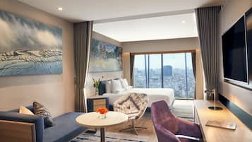 Deluxe Room, 1 King Bed, City View | Premium bedding, minibar, in-room safe, desk