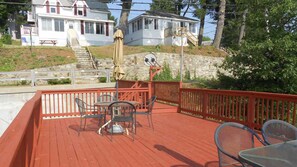 Outdoor dining - Winnipesaukee - Lakefront house includes slip, deck, kayaks & sleeps up to 11 (Alton)