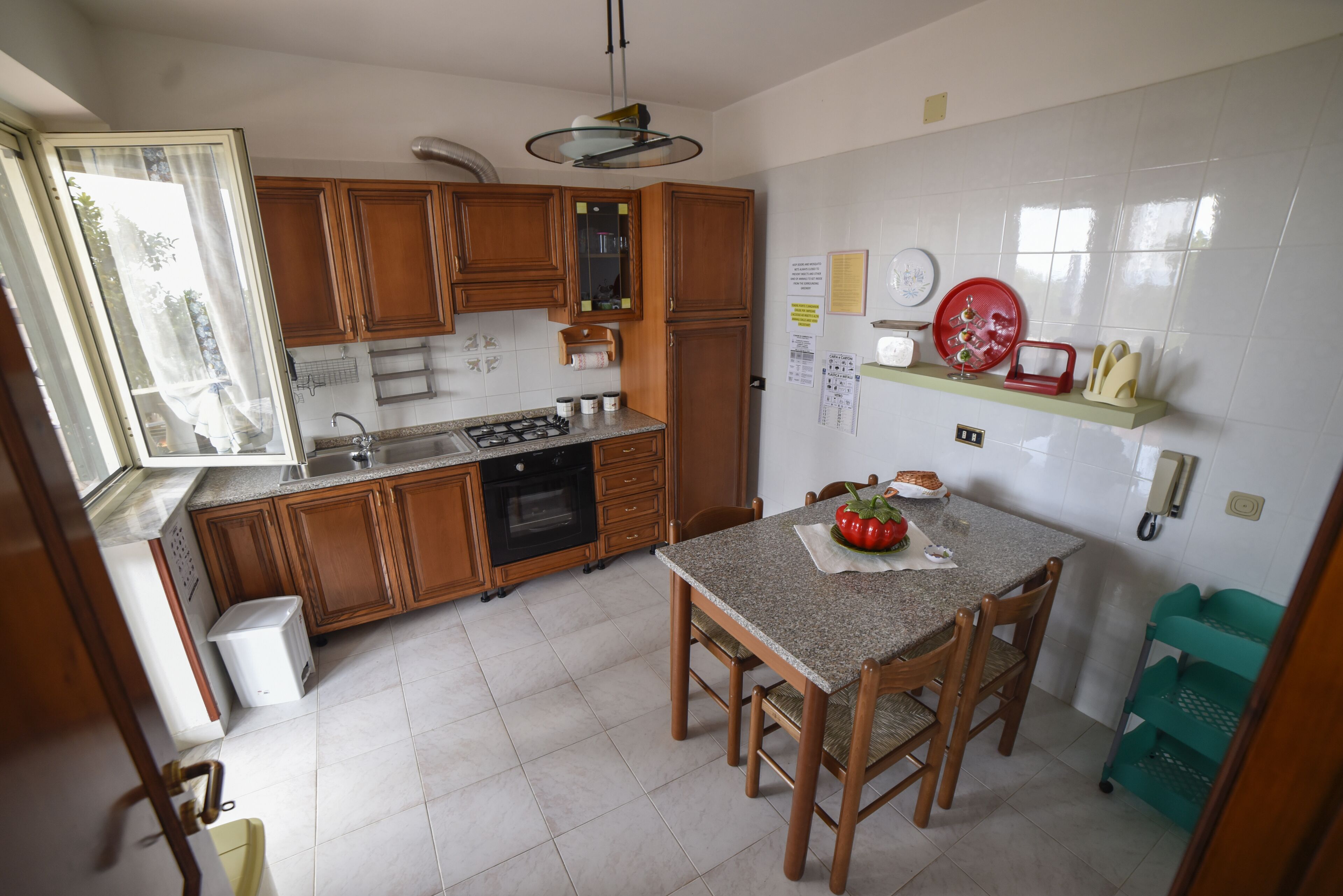 Coffee/tea maker, fridge, oven, cookware/dishes/utensils