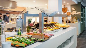 A buffet area with various food items and a bakery sign in the background. - ALEGRIA Mariner - Adults Only (Lloret de Mar)