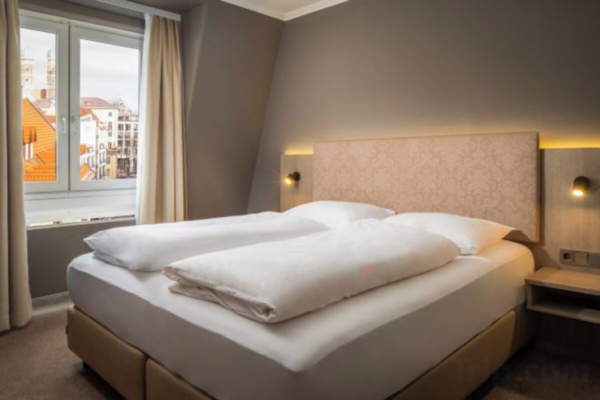 Premium bedding, down comforters, pillowtop beds, minibar