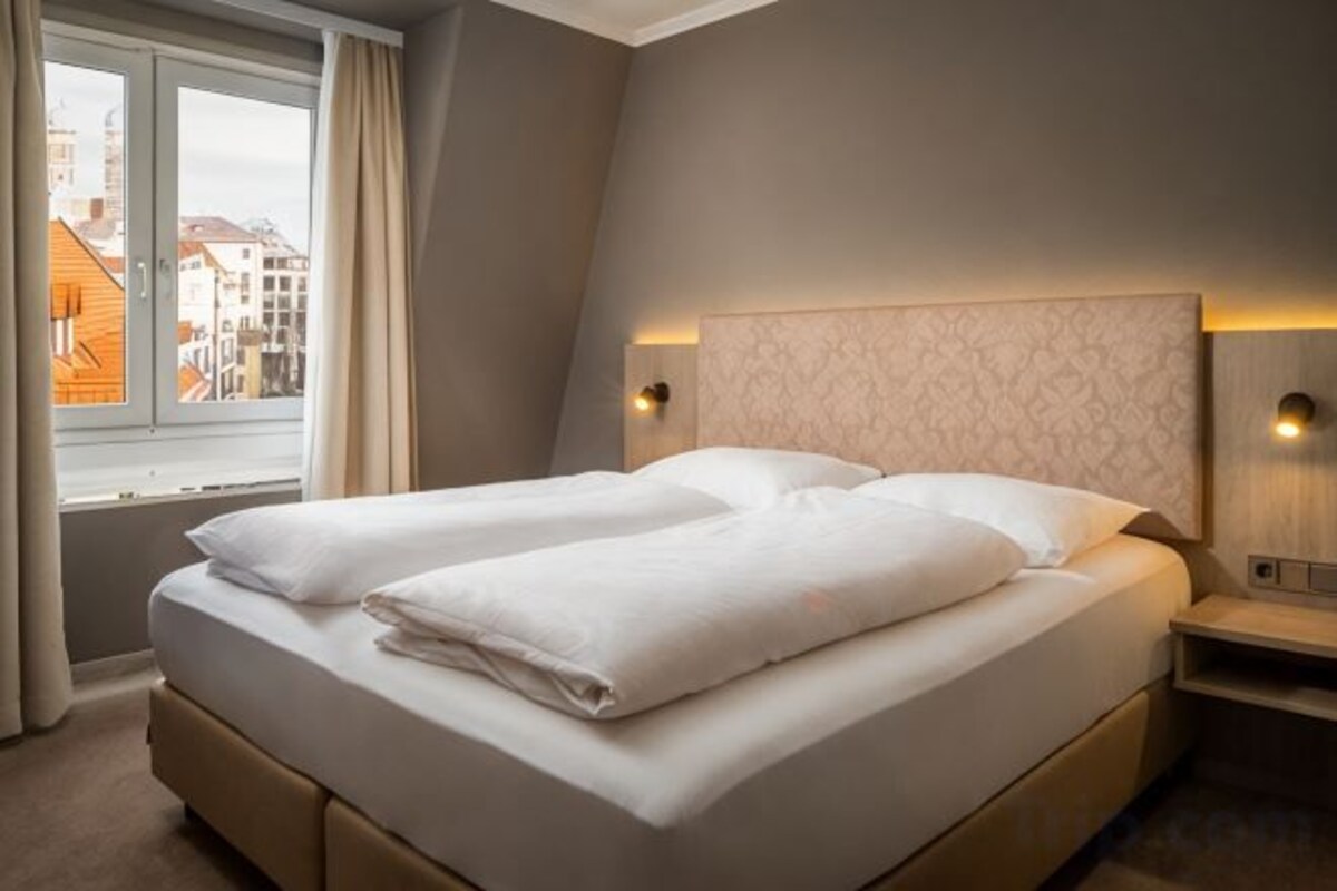 Premium bedding, down comforters, pillowtop beds, minibar