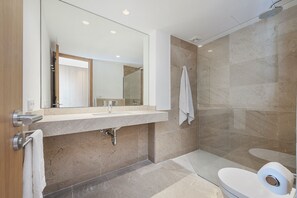 Bathtub, hair dryer, towels