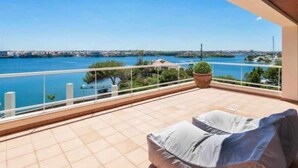 A balcony with a view of the sea and a potted plant. - VILLA LANTANA - Class and style with incredible views over Mahon harbour (Mao)