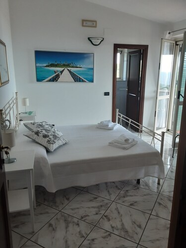 Double room with bathroom, small terrace with sea view