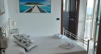 Double room with bathroom, small terrace with sea view