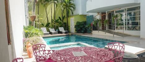 Outdoor pool, open 8:00 AM to 7:00 PM, sun loungers
