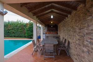 Seasonal outdoor pool, pool umbrellas, pool loungers