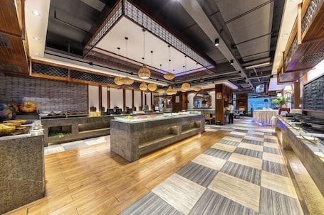 Restaurante. Times Holiday Hotel