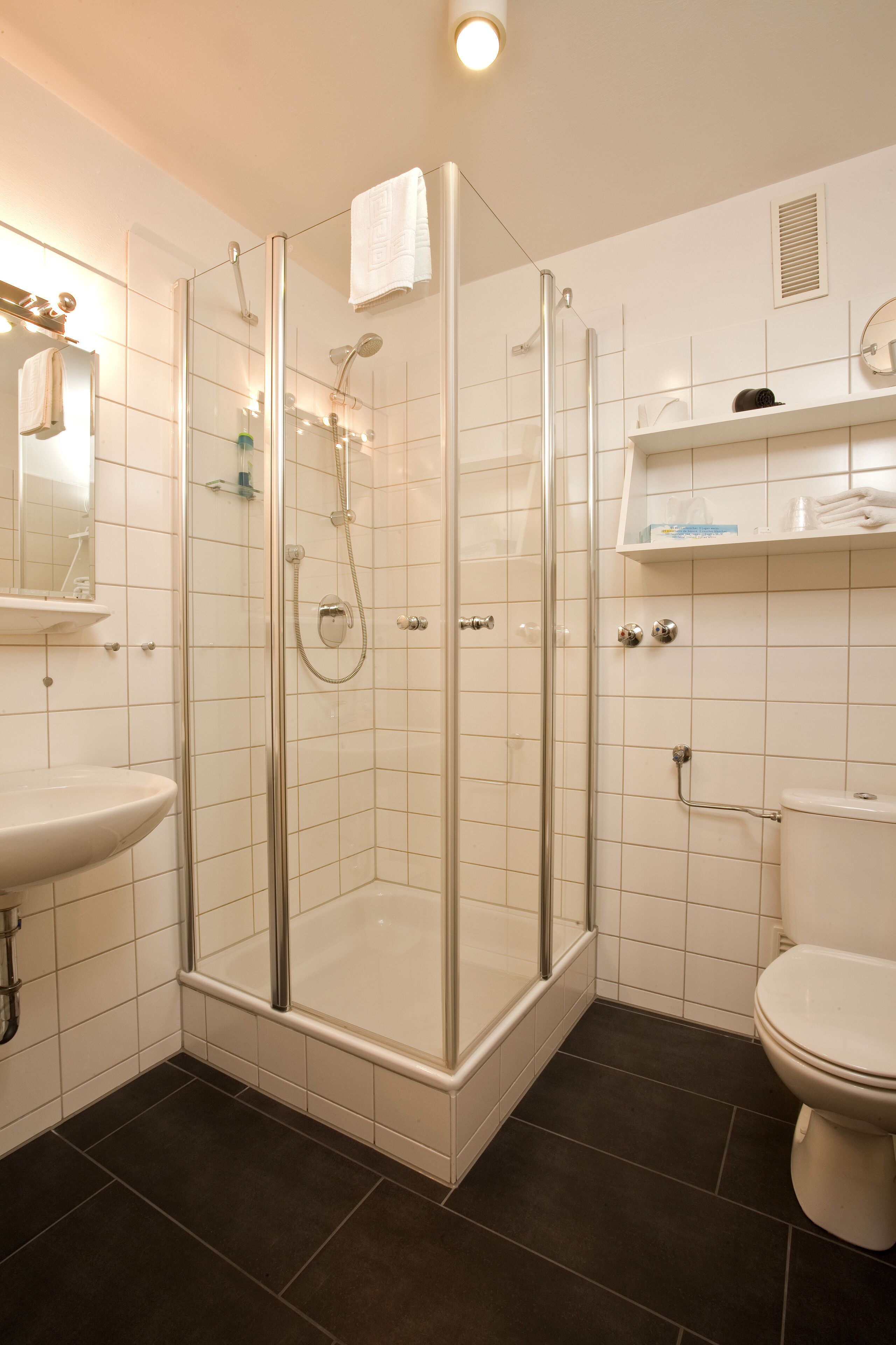 shower, eco-friendly toiletries, towels