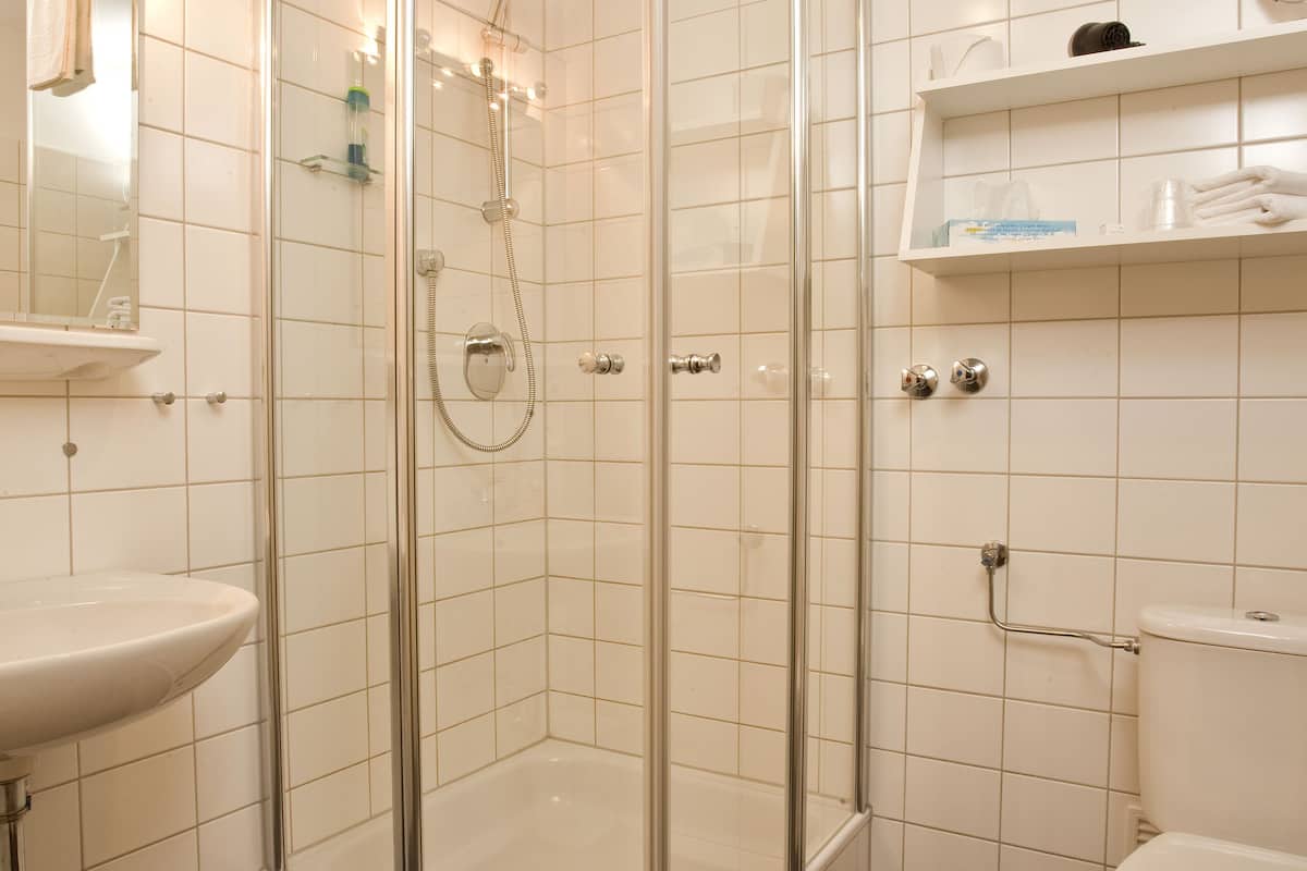 shower, eco-friendly toiletries, towels