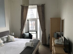 Ropa de cama de alta calidad y tabla de planchar con plancha