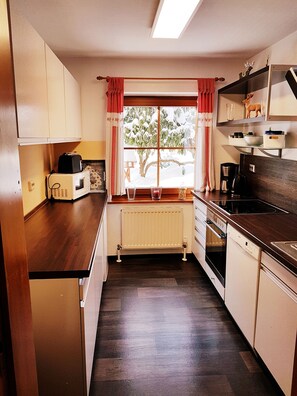 Fridge, microwave, oven, stovetop - Ferienhaus Kristall, right in St. Englmar - with "Bavarian Forest" in the garden!  (Sankt Englmar)