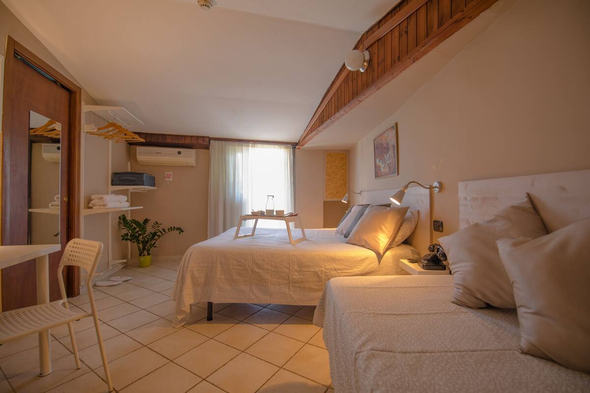 Comfort Triple Room | Desk, blackout drapes, cribs (surcharge), WiFi (free)