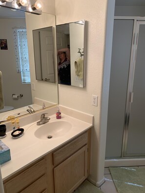 Combined shower/tub, hair dryer, towels, toilet paper