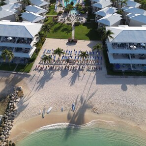 On the beach, sun loungers, beach towels