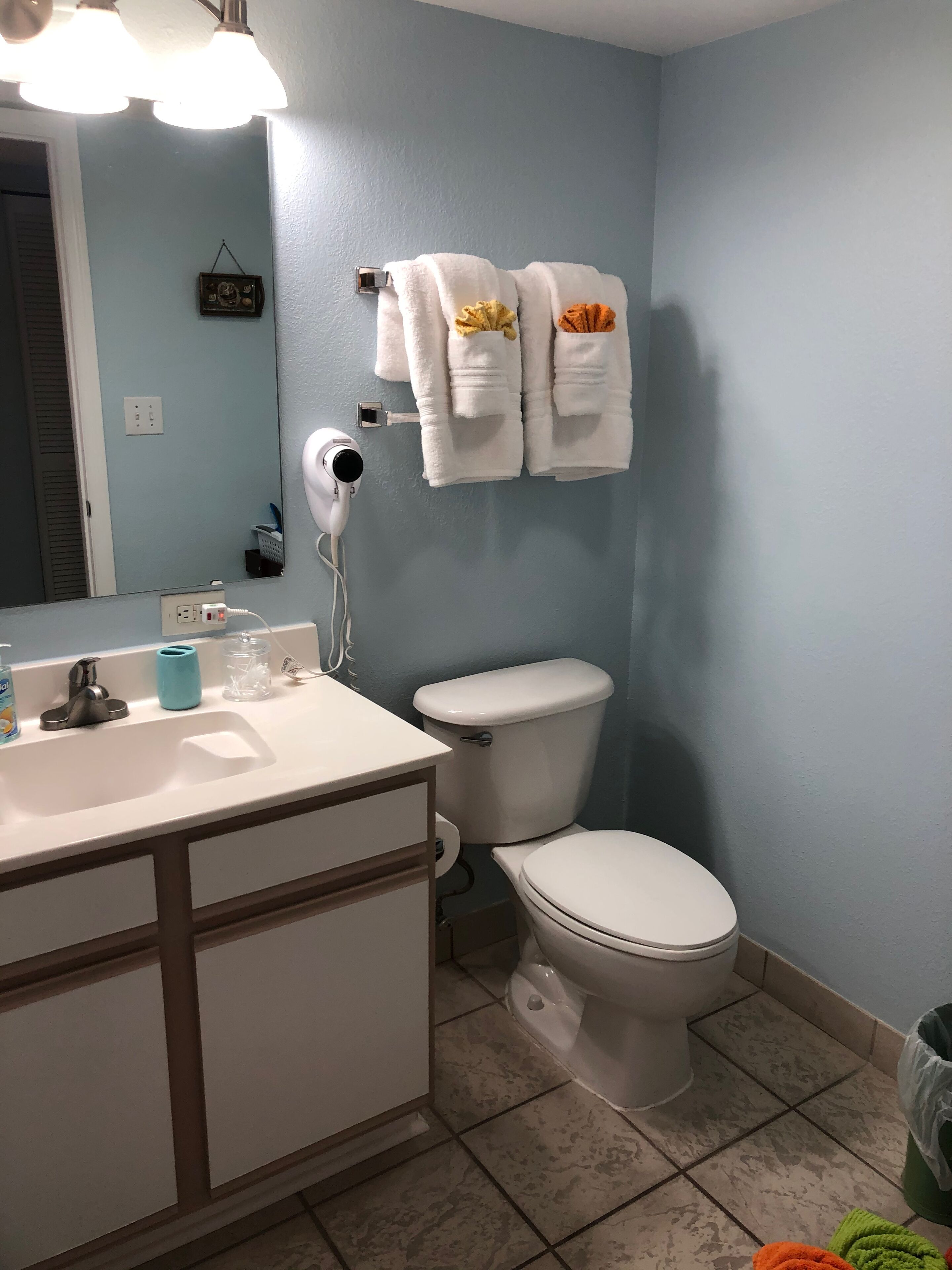 combined shower/bathtub, hair dryer, towels, soap
