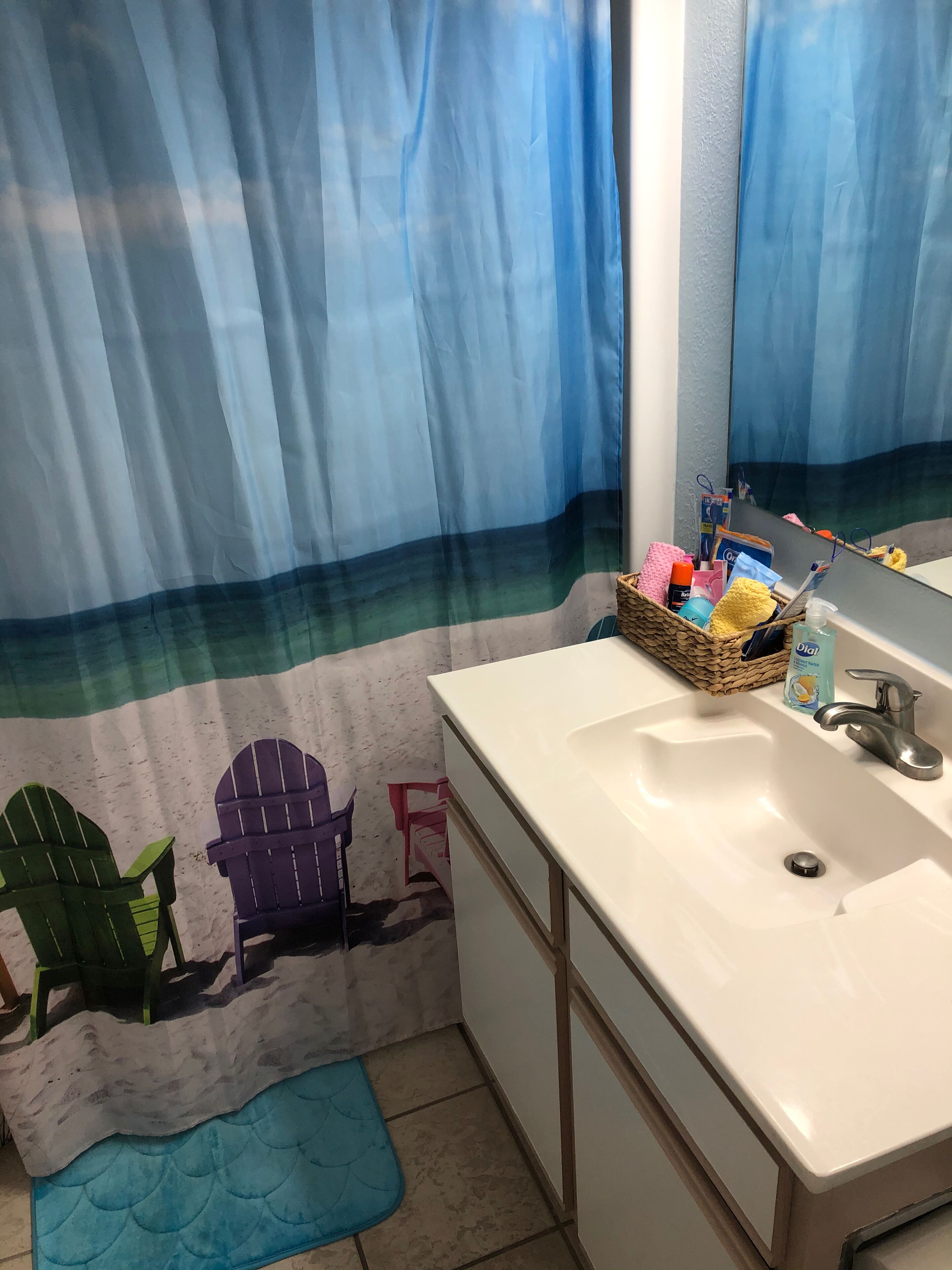 combined shower/bathtub, hair dryer, towels, soap