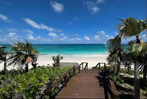 On the beach, sun loungers, beach towels