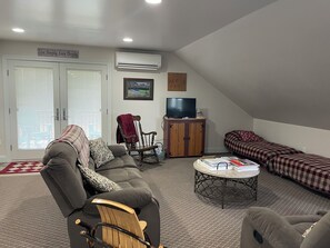 TV, DVD player, books, video library