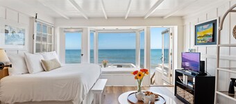 Romantic Oceanfront Studio With Private Deck | Right On The Sand!
