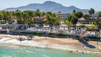 Private beach, white sand, free beach cabanas, sun-loungers